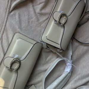 Coach Cream and Silver Clutch with Elegant Design